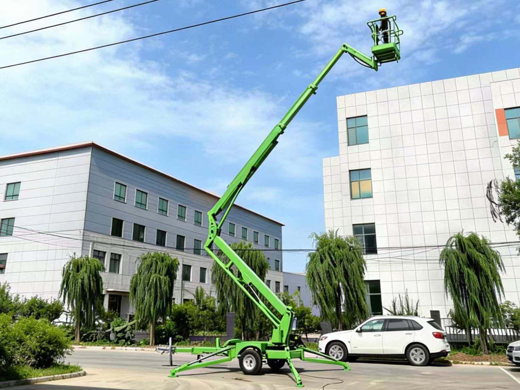 Towable Boom Lifts: Flexible and Mobile for Outdoor Maintenance Jobs