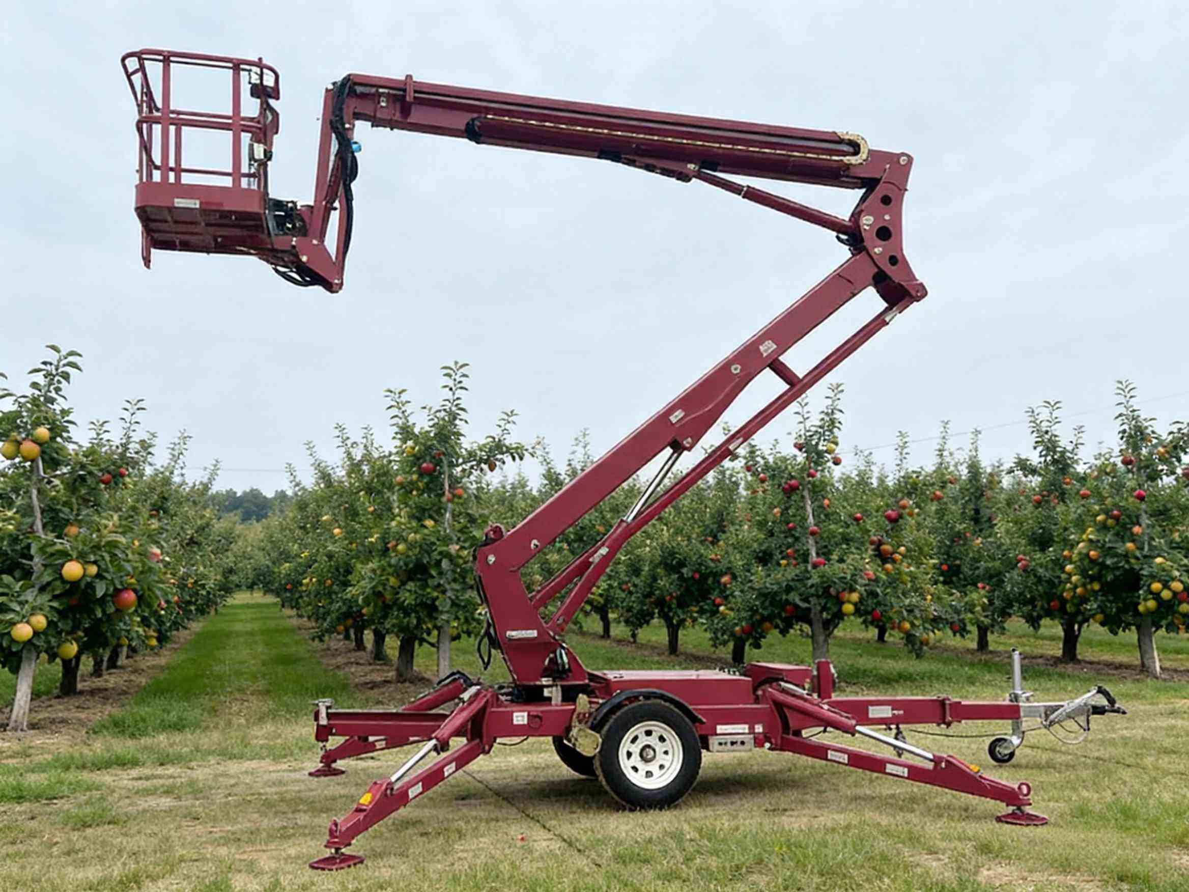 Towable Boom Lift: An Efficient and Safe Solution for High-Altitude Operations